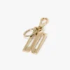 Charm-sleutelhanger in goud
