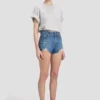 Distressed shorts in mid blue wash Distressed shorts in mid blue wash