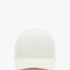 Logo-pet in antiek wit