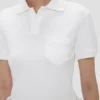 Top met polokraag in wit Top met polokraag in wit