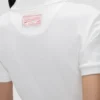 Top met polokraag in wit Top met polokraag in wit