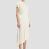 Twist-jurk met schouderdetails in ivoor